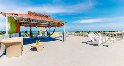 Family-friendly condo with WiFi & partial AC, located just steps from the ocean