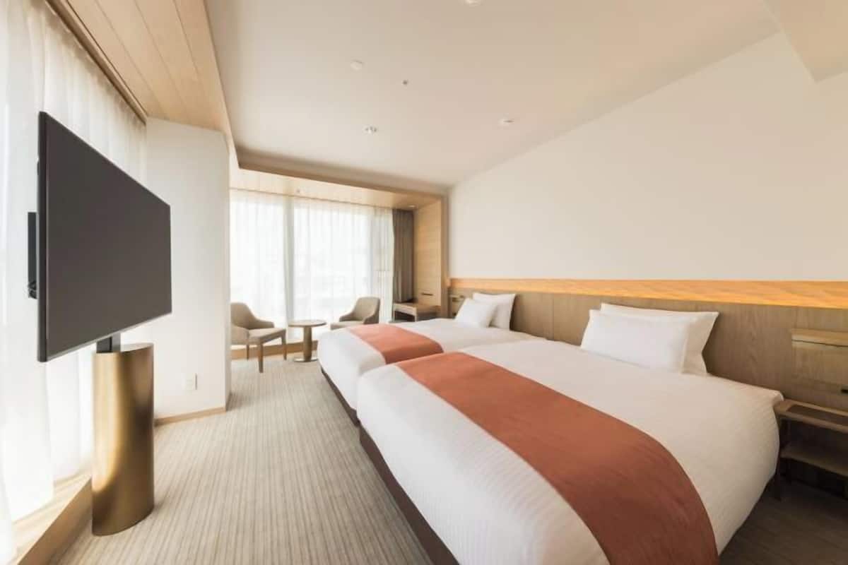 Luxe beddengoed, een kluis op de kamer, een bureau