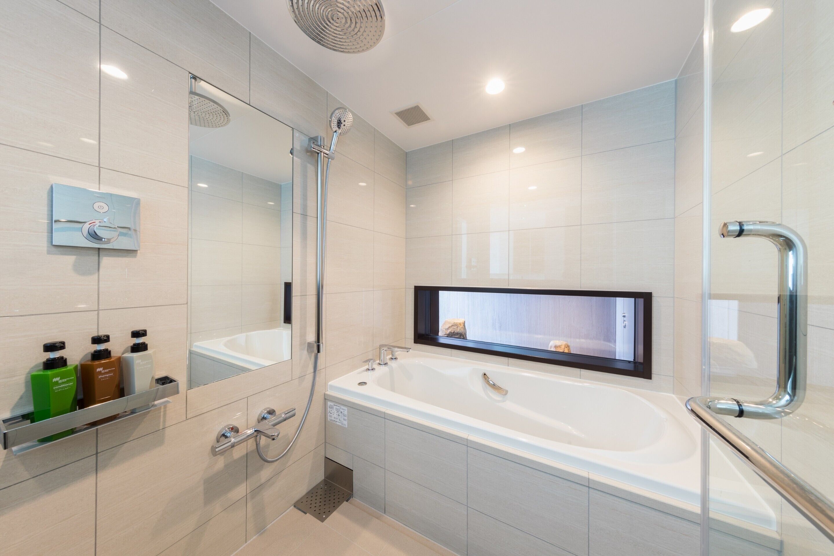 separate bathtub and shower, free toiletries, hair dryer, slippers