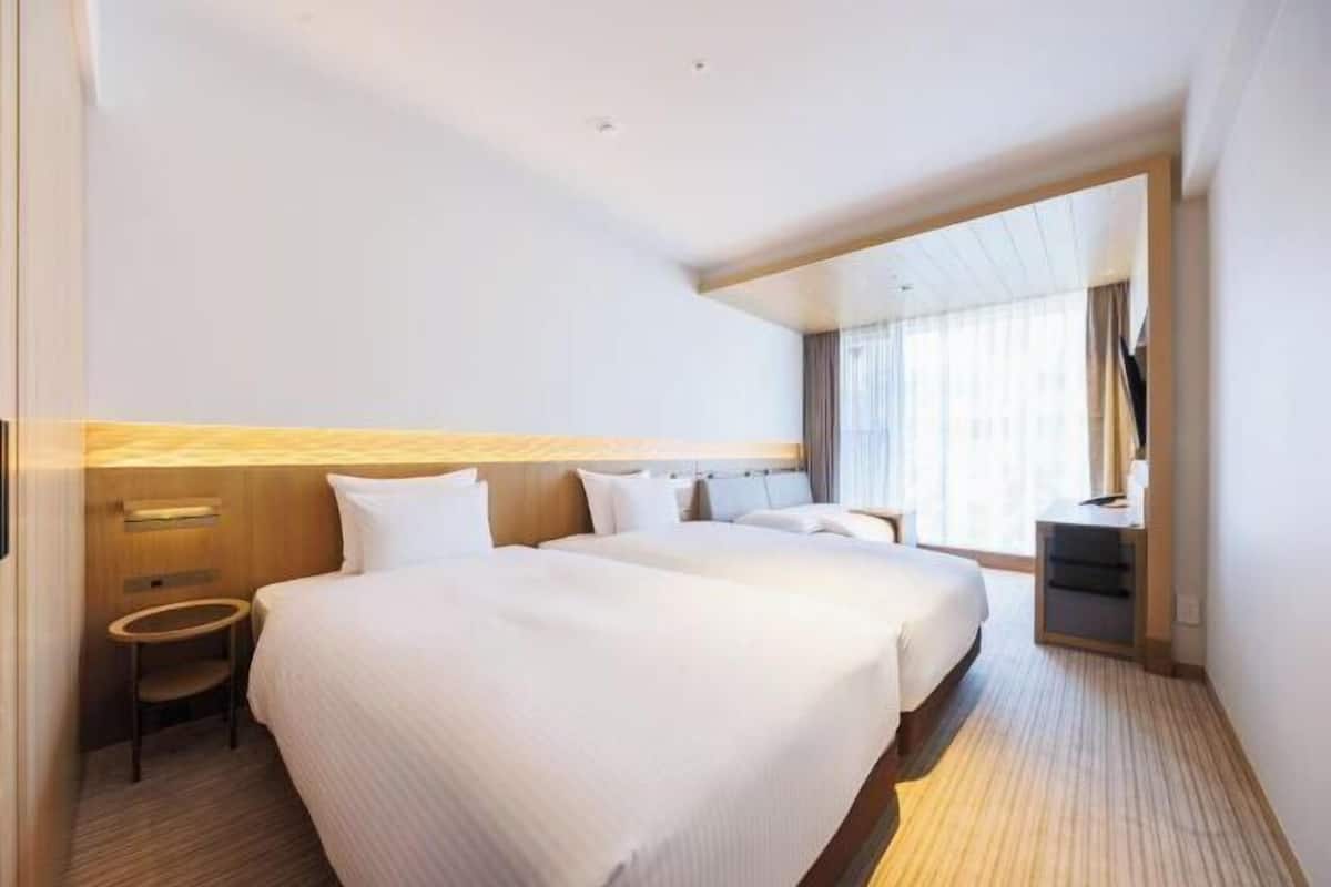 Literie de qualité supérieure, coffres-forts dans les chambres, bureau