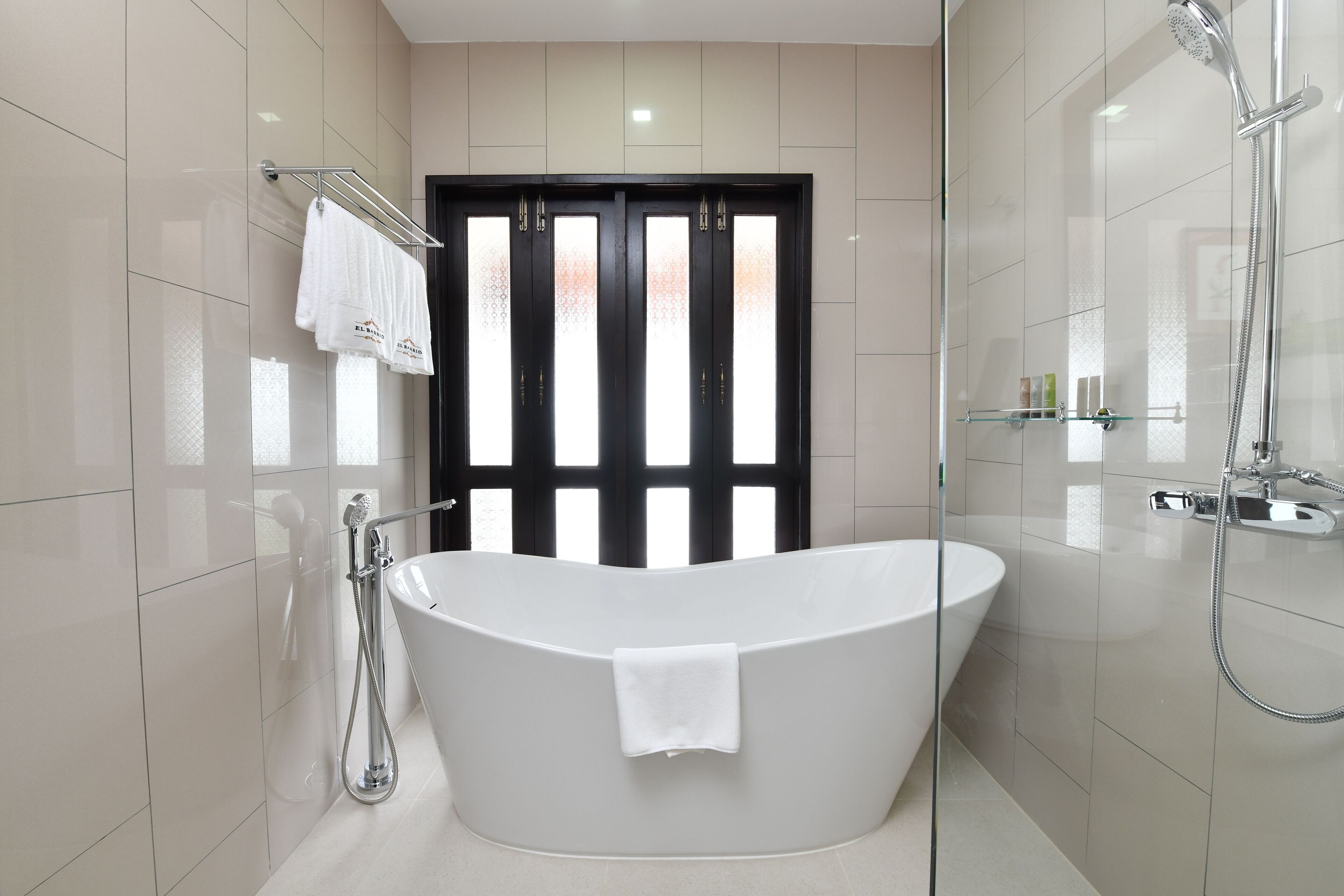 lanna deluxe room | bathroom | designer toiletries, hair dryer, bathrobes, slippers