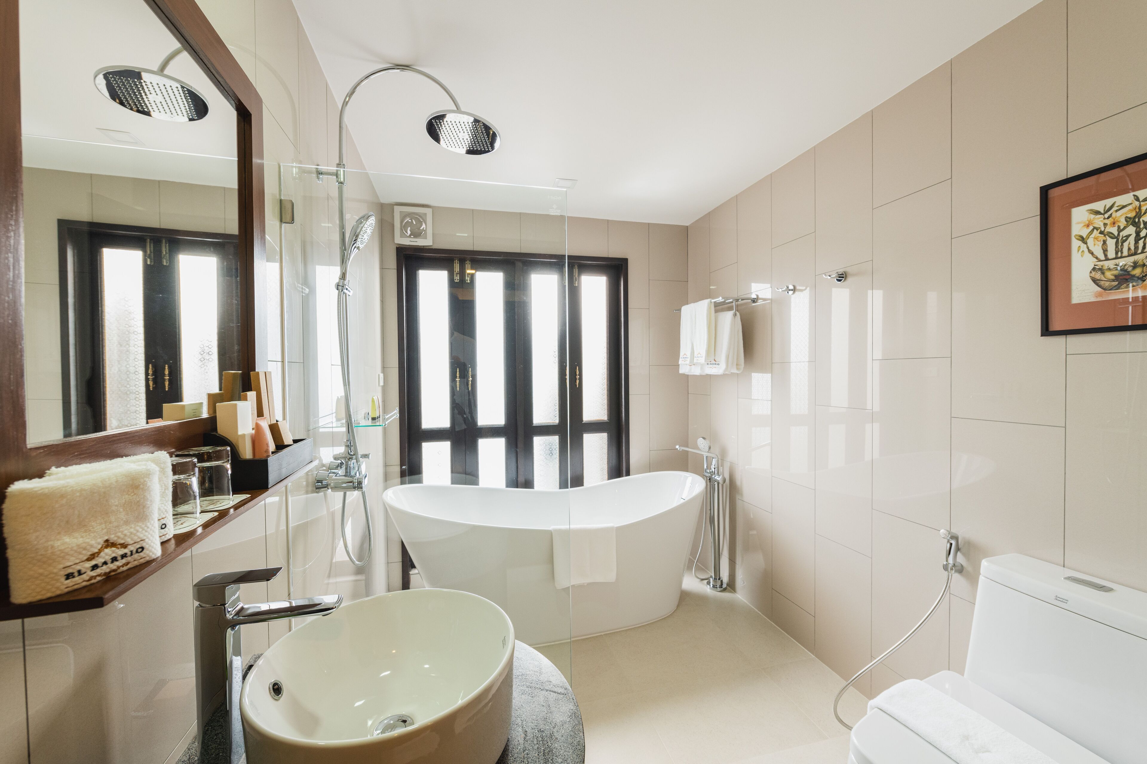 lanna signature room | bathroom | designer toiletries, hair dryer, bathrobes, slippers