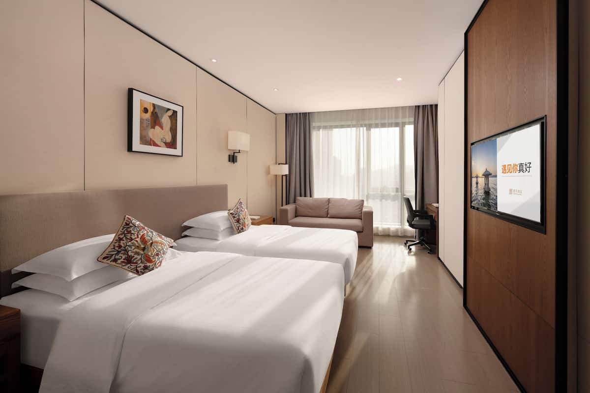 Habitación Deluxe con 2 camas individuales | Escritorio, cortinas opacas, sistema de insonorización