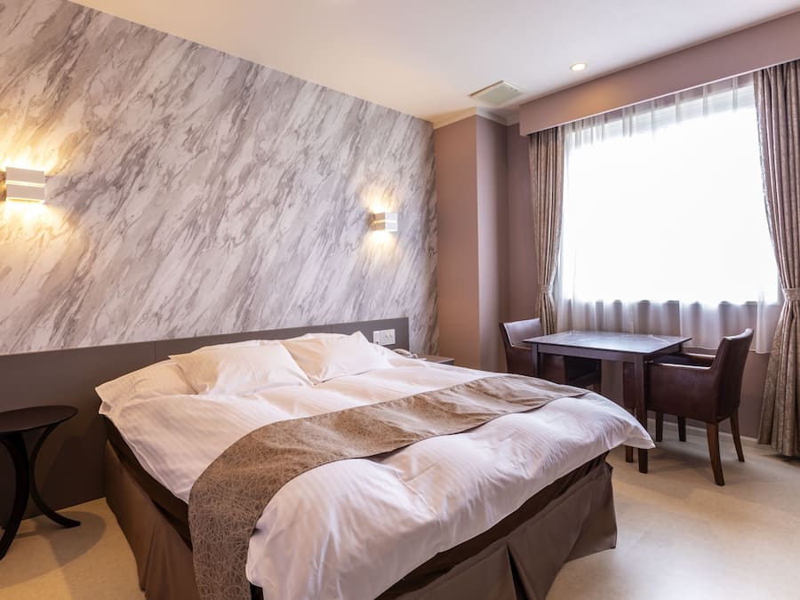 Desk, laptop workspace, blackout curtains, free WiFi