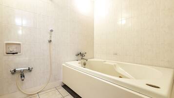 Combined shower/bathtub, hair dryer, slippers, electronic bidet