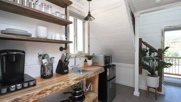 Fridge, microwave, stovetop, coffee/tea maker