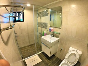 Shower, free toiletries, hair dryer, slippers