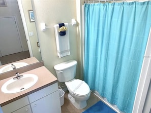 Combined shower/bathtub, hair dryer, towels, soap