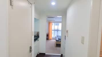 Standard Twin Room | Living area | Flat-screen TV