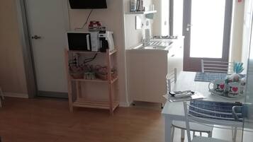 Fridge, microwave, coffee/tea maker, electric kettle