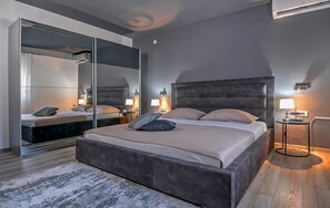 4 dormitorios, caja fuerte, tabla de planchar con plancha y wifi