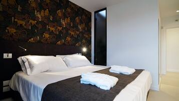 Frette Italian sheets, premium bedding, down duvets, memory-foam beds