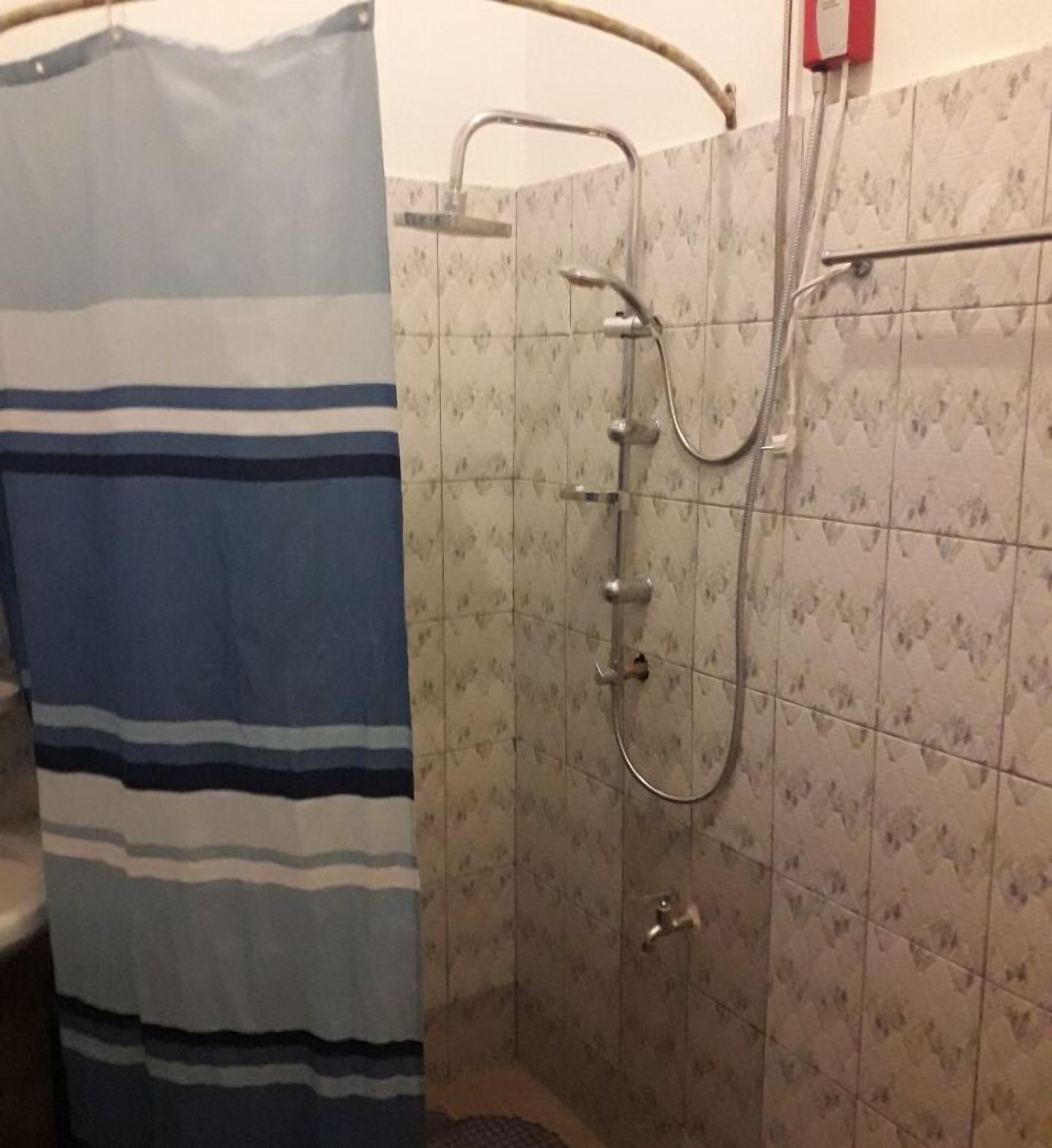 Shower, towels, soap, shampoo