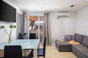 Mobile home Relax premium - whirlpool, 2nd line | Living area | Flat-screen TV, table tennis - Camping Almissa (Omis)