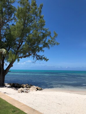 On the beach, sun loungers, beach towels