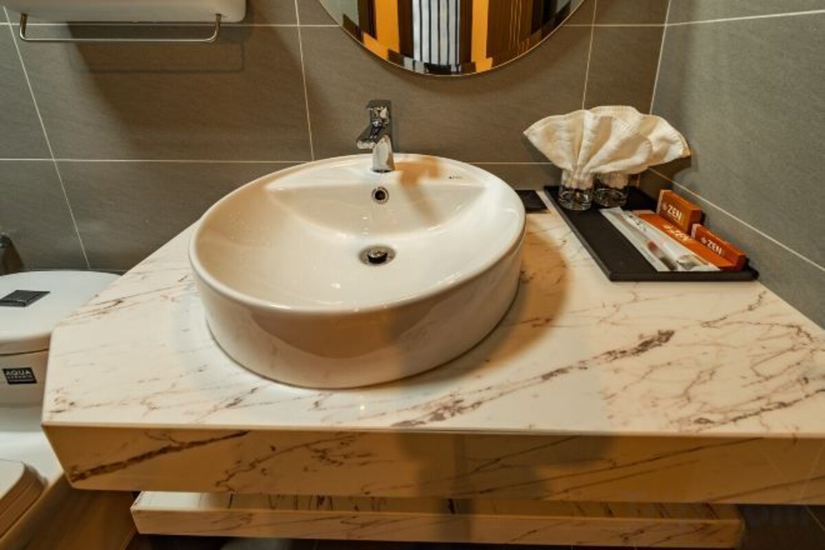 Bathroom | Shower, designer toiletries, hair dryer, slippers