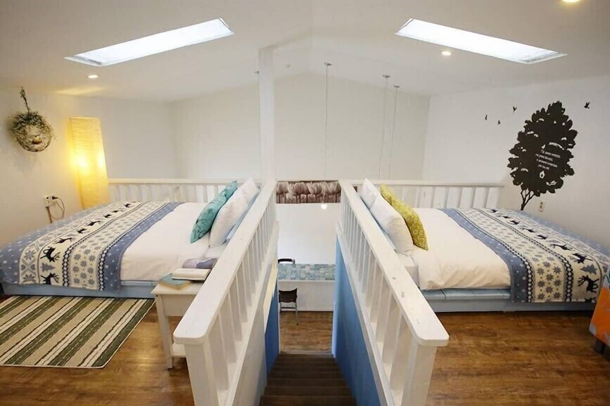 Duplex, Jetted Tub (2 - Only for Family or Female Guests) | Down comforters, WiFi (free), individually decorated