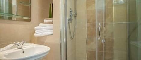Shower, free toiletries, hair dryer, towels