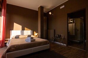 Suite estudio junior | Minibar, escritorio, wifi gratis y ropa de cama