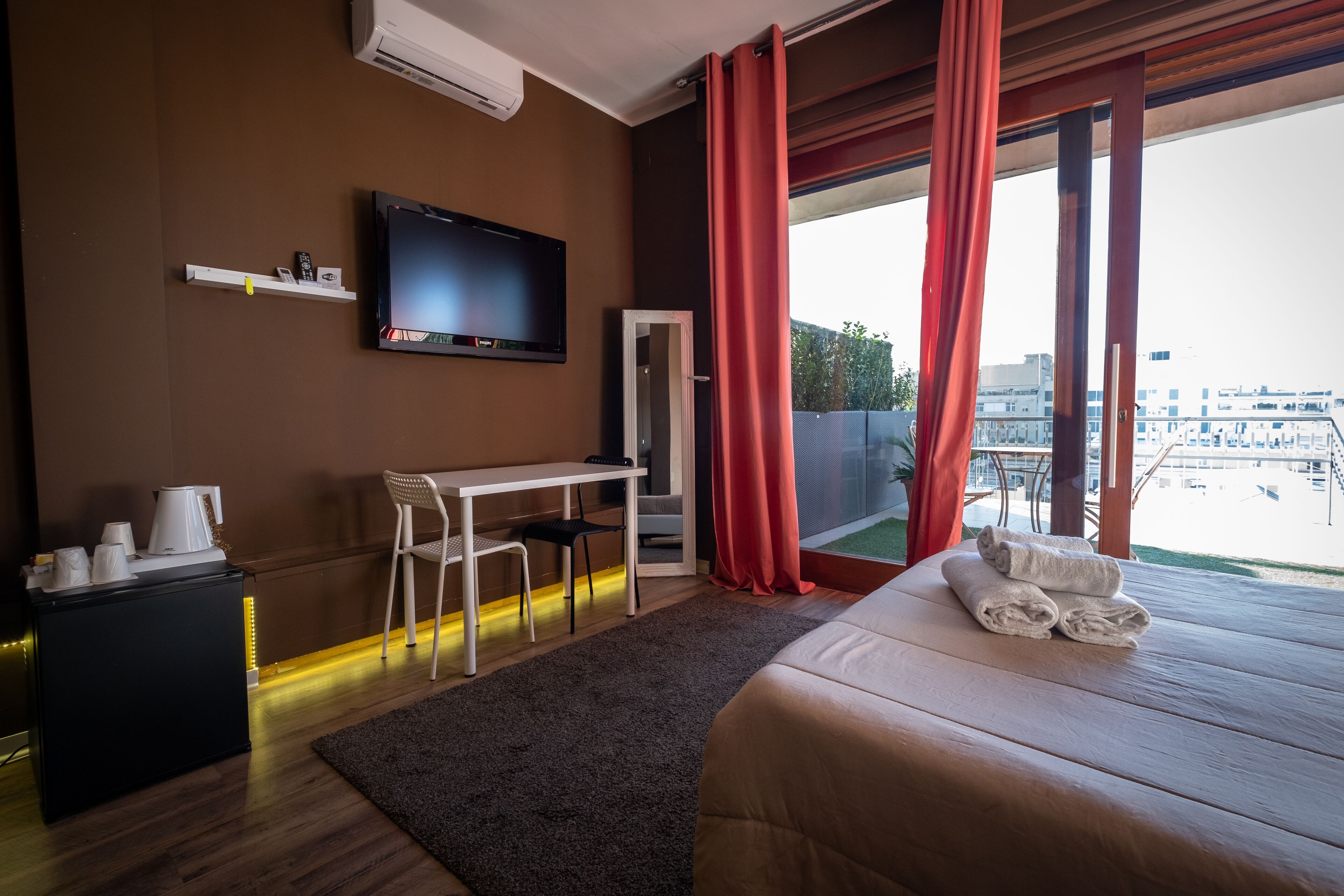Junior studio suite | Een minibar, een bureau, gratis wifi, beddengoed