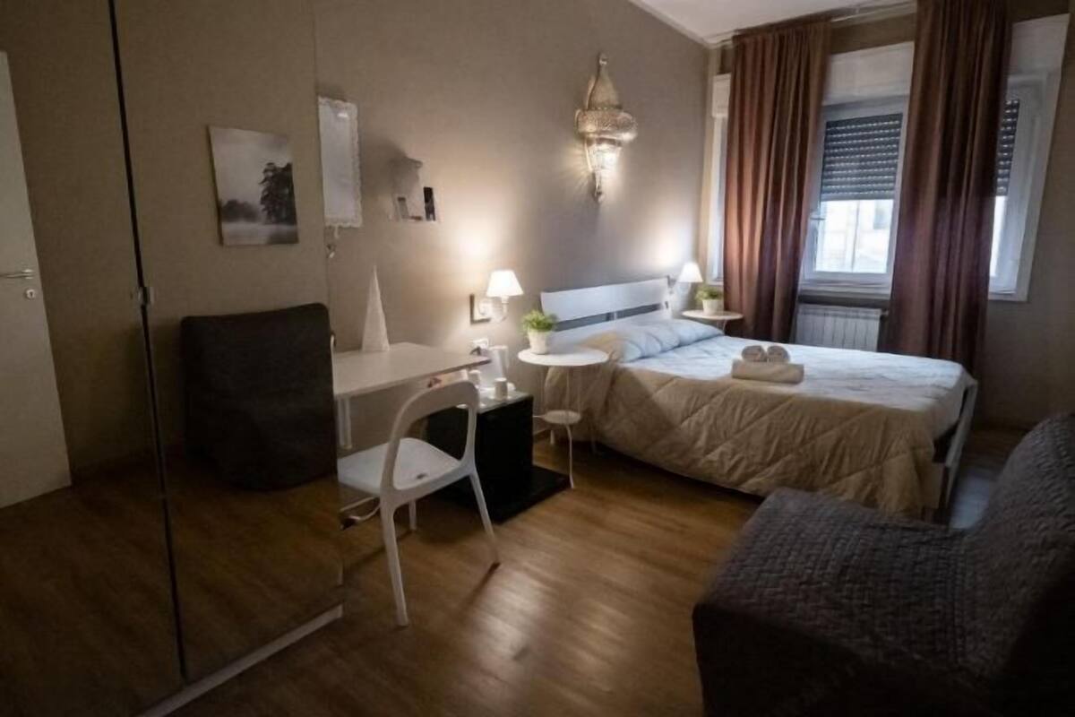 Premium bedding, down comforters, desk, laptop workspace