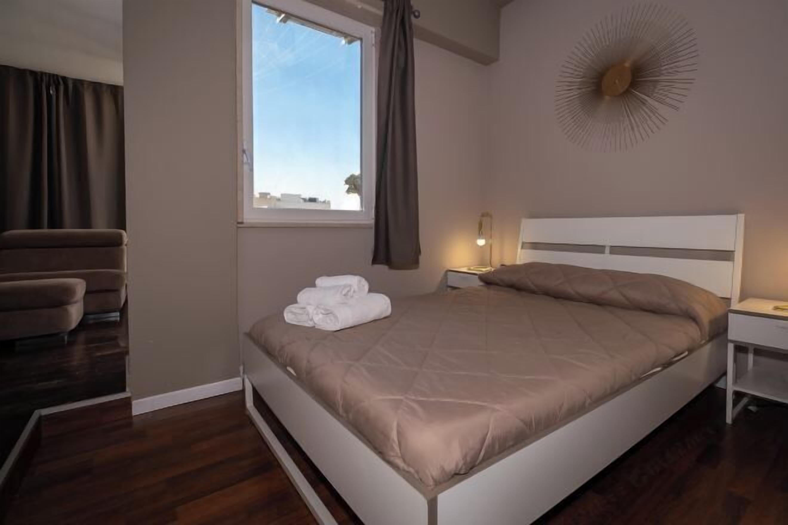 Premium bedding, down duvets, desk, laptop workspace