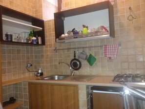 Double Room, Terrace (Loft Bed) | Private kitchen | Fridge, stovetop, coffee/tea maker, electric kettle - B&B Levantino (Bari)