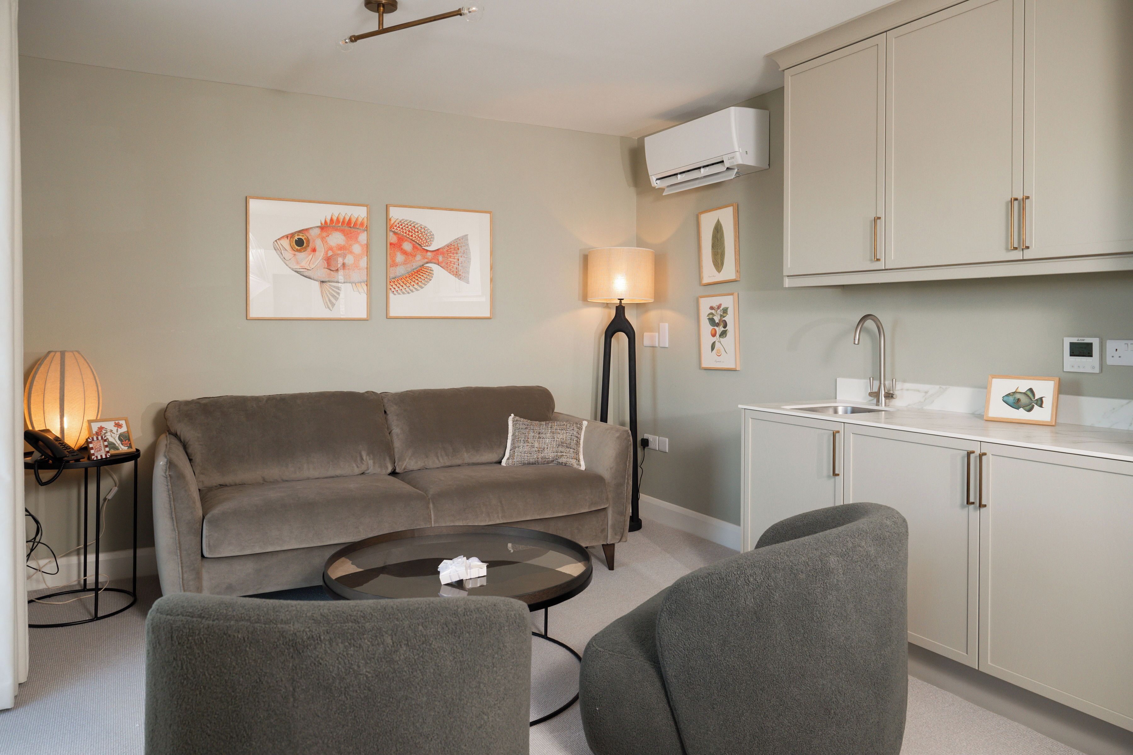 luxury studio suite | living area | 50-inch smart tv with digital channels