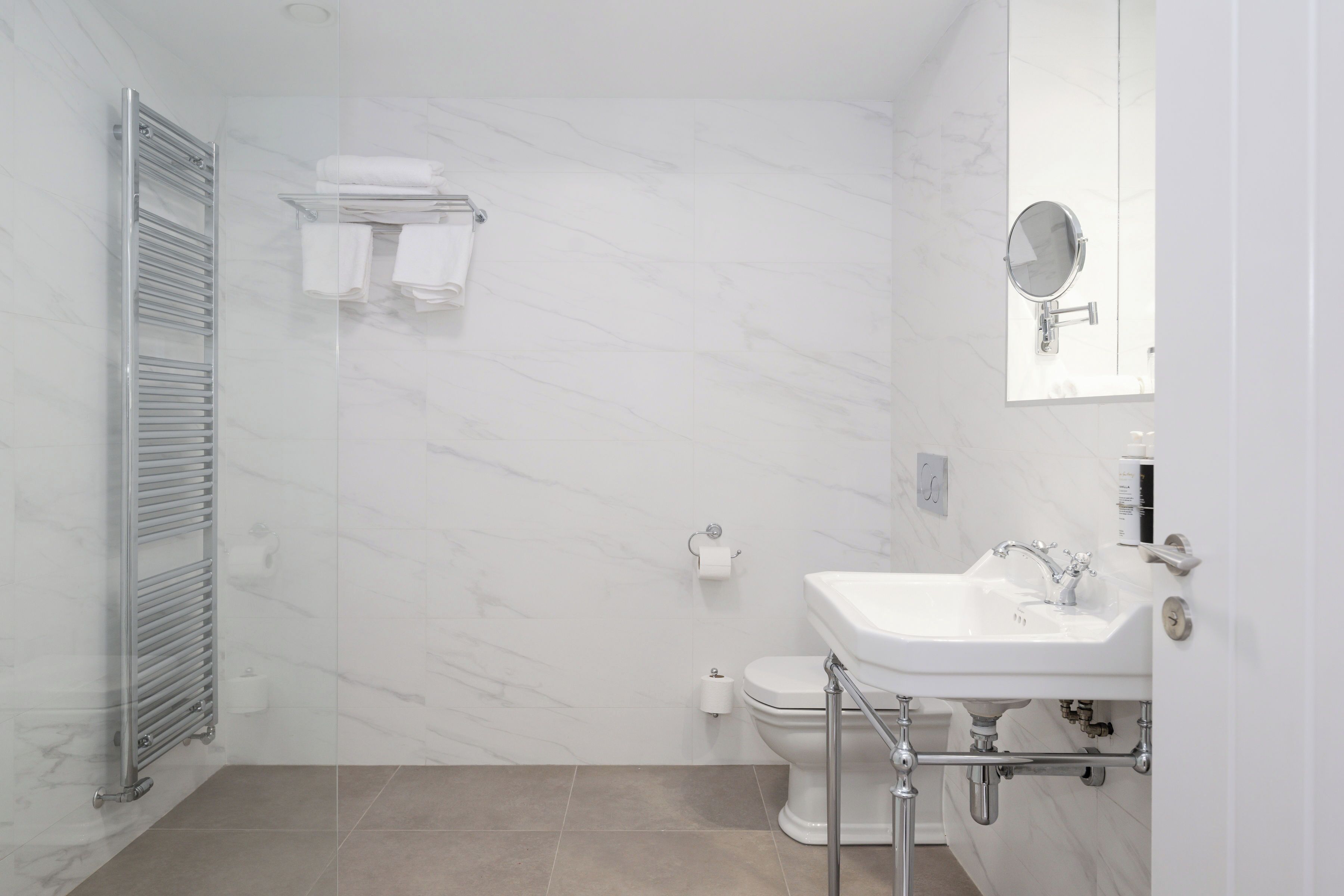 shower, designer toiletries, hair dryer, bathrobes