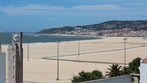 A coastal cityscape with a beach, a pier, and a clock tower. - Costa de Prata Hotel (Figueira da Foz)