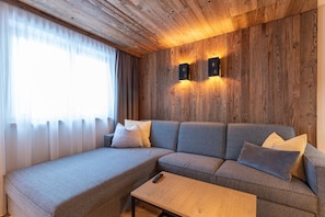 Exclusive Apartment | Living area | 40-inch flat-screen TV with cable channels, LED TV