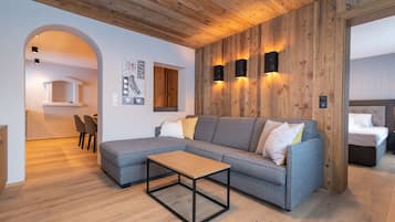 Exclusive Apartment | Living area | 40-inch flat-screen TV with cable channels, LED TV