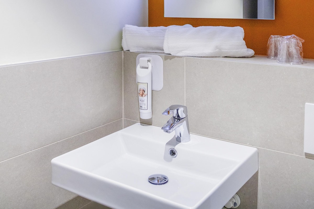 Desk, blackout drapes, soundproofing, iron/ironing board