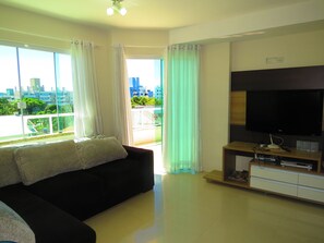 Appartement, plusieurs lits | Coin séjour