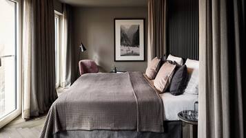 Ropa de cama hipoalergénica, minibar, caja fuerte