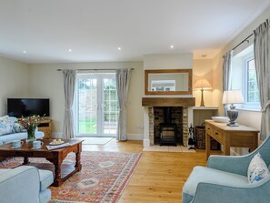 TV, fireplace - Sea Lavender Cottage-UK11930 (Thornham, near Kings Lynn)