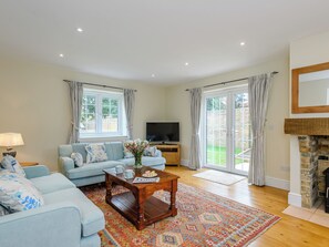 TV, fireplace - Sea Lavender Cottage-UK11930 (Thornham, near Kings Lynn)