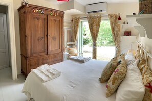 2 dormitorios, tabla de planchar con plancha, cuna de viaje y wifi