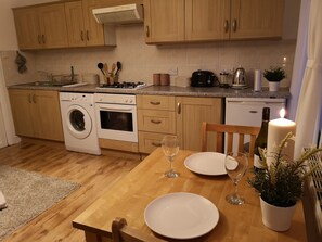 Apartment, 1 Bedroom | Private kitchen | Fridge, microwave, oven, stovetop