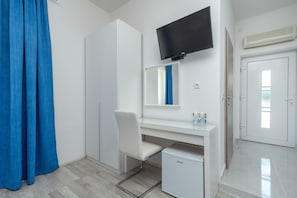 Ropa de cama de alta calidad y minibar 