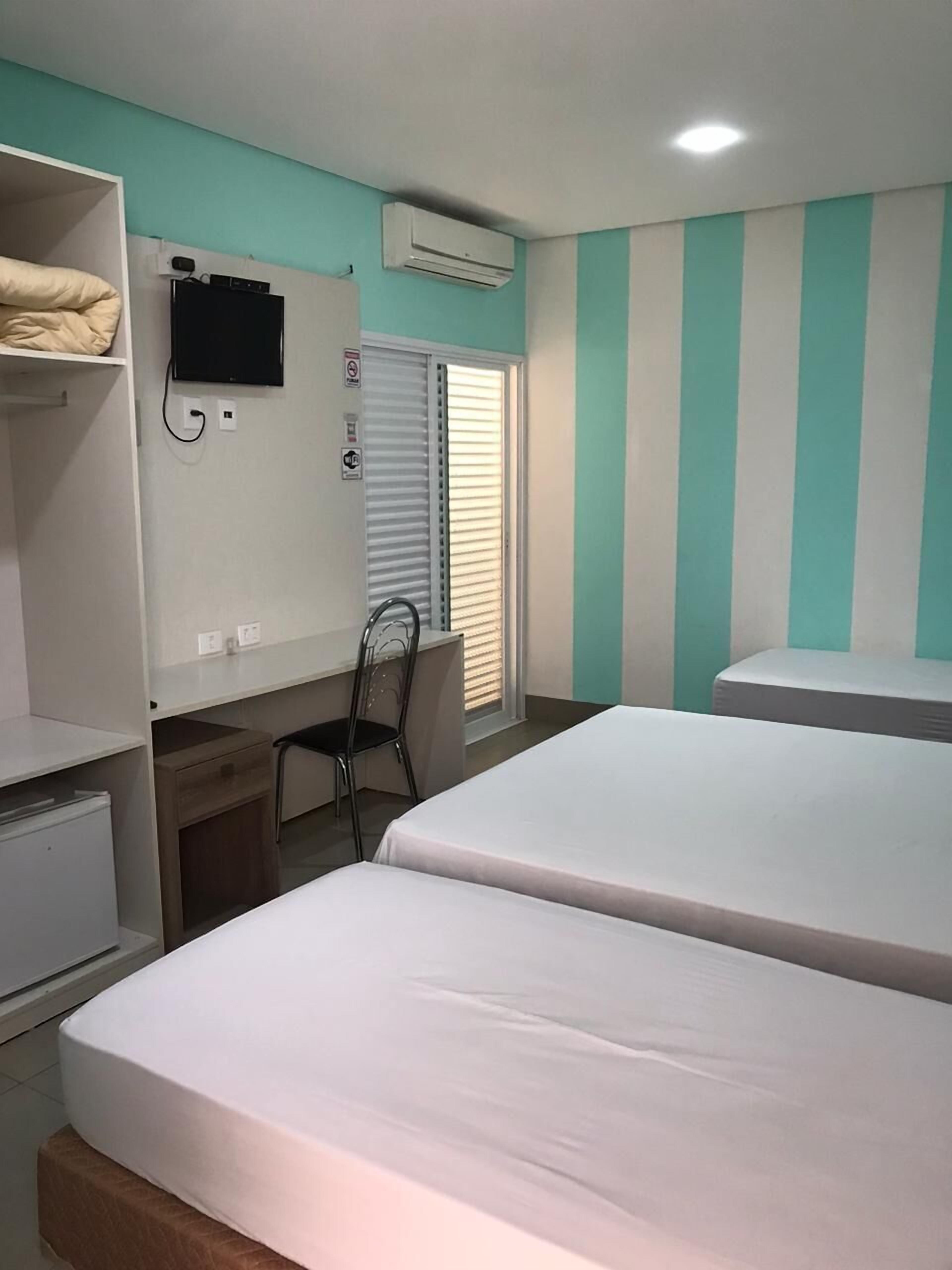 deluxe room, 2 single beds | minibar, in-room safe, desk, free wifi