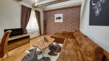 Comfort Apartment | Living area | Flat-screen TV