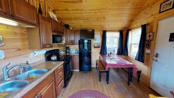 Cabin (White Pine Cozy Secluded Cabin, Stunn) | Private kitchen | Full-sized fridge, oven, coffee/tea maker