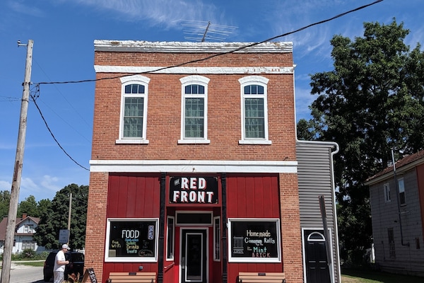 Front of the building. The apartment occupies the entire second floor.