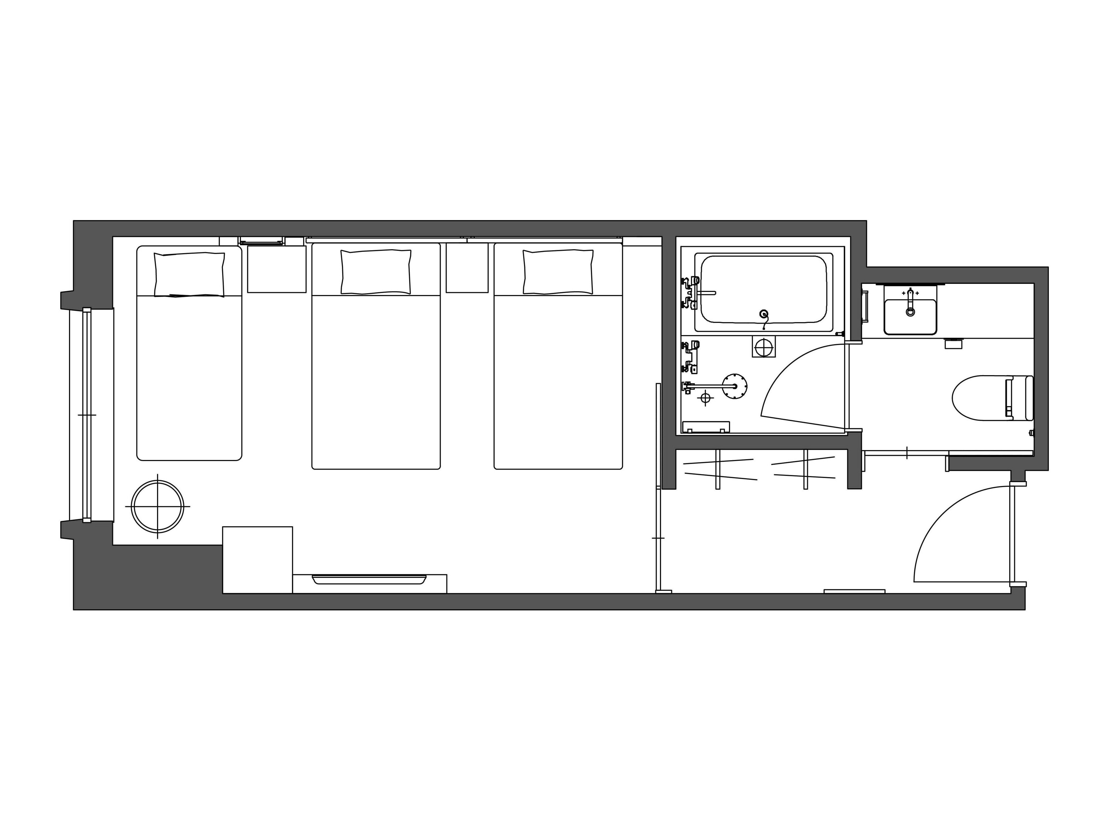 A floor plan of a hotel room with a large bed, a separate bathroom, a small kitchen area, and a seating area.