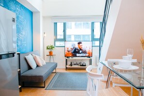 Comfort Loft Apartment | Living area | Smart TV, Netflix, streaming services