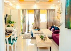 Appartement Exclusif (26E) | Coin séjour | TV connectée, Netflix, services de streaming