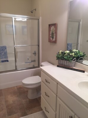 Combined shower/bathtub, hair dryer, toilet paper - Amazing Canal Home....Pender Street Paradise on the waterway!! (Ocean Isle Beach)
