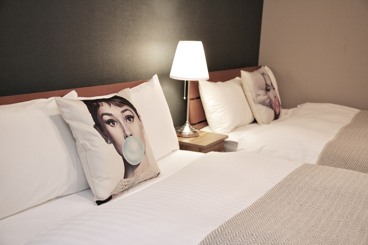 Laptop workspace, free WiFi, bed sheets