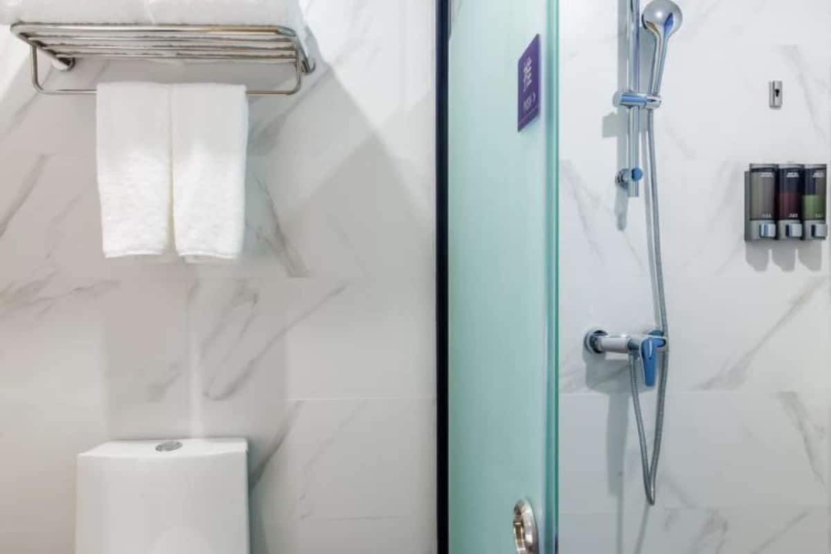 Shower, free toiletries, slippers, towels
